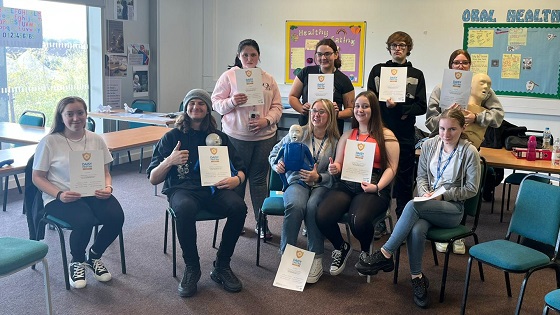 Picture of Early Years students with their first aid certificates